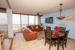 Living Room and Dining Area. Table expands with chairs for six.