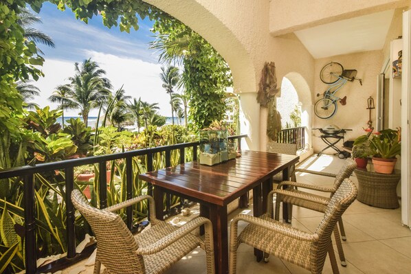 Double patio equipped with BBQ, bike, and hammock 
