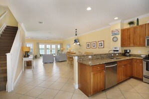 Spacious living area with a downstairs powder room