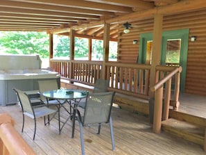 Covered 2nd tier deck w. Table & Chairs. More on 1st & 3rd Deck