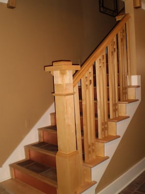 stairs with copper risers and tile inserts