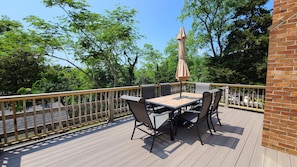 Back deck with outdoor dining table