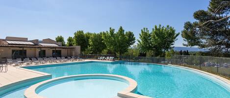 Dive into the lovely seasonal outdoor pool during the summer.