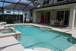Large covered lanai to shade from the sun -  poolside toilet & outside shower