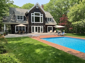 Heated pool, red brick patio & large cedar deck