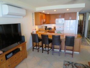 Bar with bar stools and TV