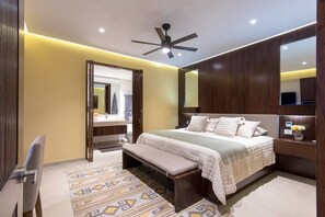 Adjoining bath, nightstands with ample power and USB charging outlets.