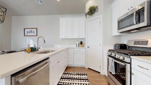 Fully stocked gourmet kitchen