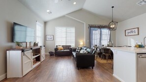 Family room featuring a large flat screen tv