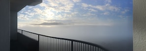 Another view of peaks above clouds from balcony