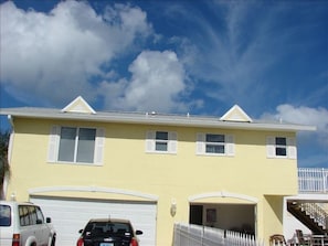 Second story apartment with living room view of ocean