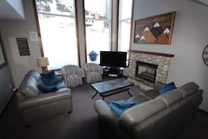 Enjoy your Cozy Fireplace and Watch the Skiers Come down the Mountain.