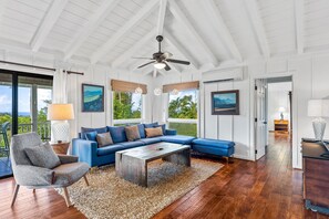 Main House living area with new paint, new furniture, and full house AC system.