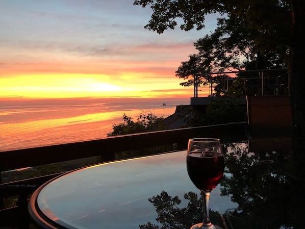 Amazing Sunsets from the deck and Cottage and with direct access to your beach 