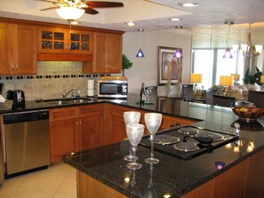 Our fully stocked, beautiful kitchen with granite counters.