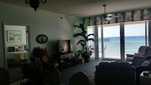 Living Area with Flat Screen TV, 2 Recliners ~ Opens to Balcony