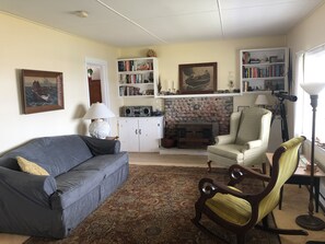 Comfortable living room with view of Bay.