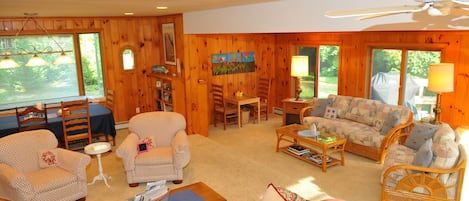 View of dining area, game area, multi-level seating
