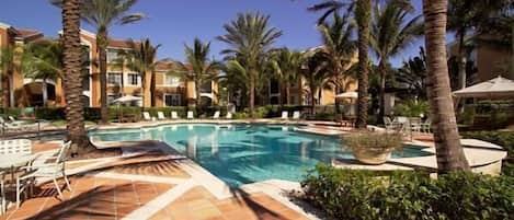 Pool with condos in background