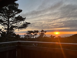 Amazing sunsets and ocean views from upper deck of Primary Bedroom.