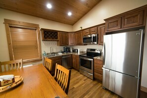 Full Kitchen:  Range, microwave, refrigerator/freezer, dishwasher