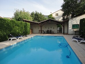 The pool area is very private and only visible from the house itself.