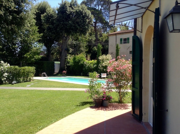 Looking from terrace to garden and pool.