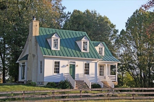 Front of cottage, French doors on left lead to stone patio