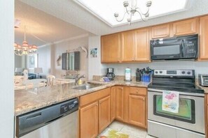 Kitchen with Stove, Microwave, Dishwasher, Coffee Maker, Toaster Oven