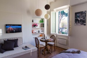 Sofa (bed) to relax and admire the Dome, wood flooring 