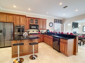 Large Kitchen Prep Area with New Appliances and Gas Cook Top