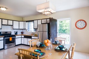 The screen door to the backyard brings the outdoors in