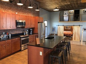 Glorious kitchen with the barn doors into the master suite