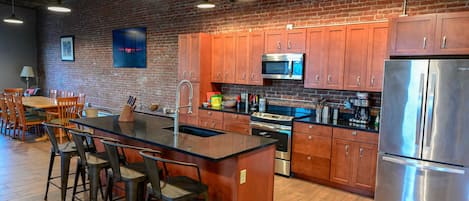 Massive modern kitchen with breakfast bar! 