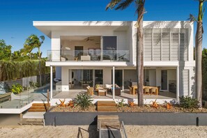 Waterfront view of house. 