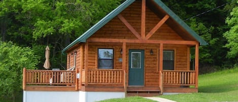 Brand new log cabin set into the trees.  So inviting!