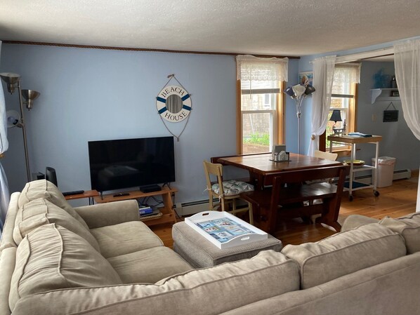 View from entry door: Living area/dining. Kitchen off of living area.