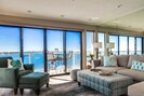 Living room and balcony with incredible views of Mission Bay