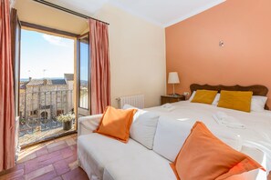 Master Bedroom with Town View and Balcony