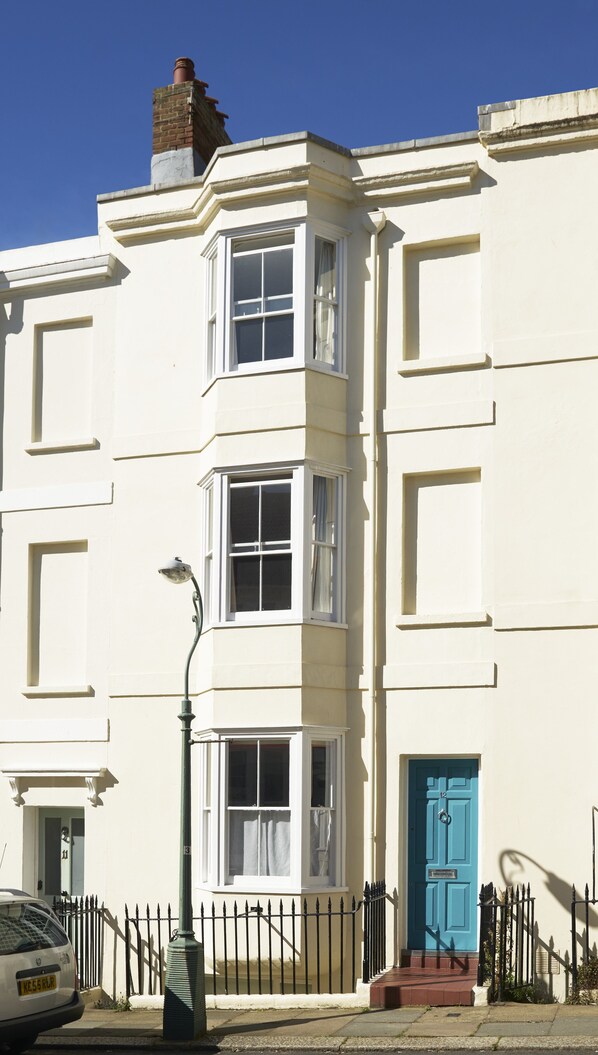 It's a typical 1830's Brighton seaside house, tall & skinny - always sunny!