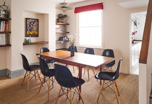 Extending dining table seats up to 8.