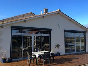 Sunny decked area at the back of the house