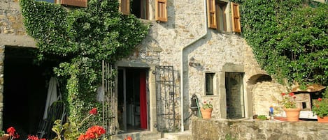 The front doors opening onto the terrace