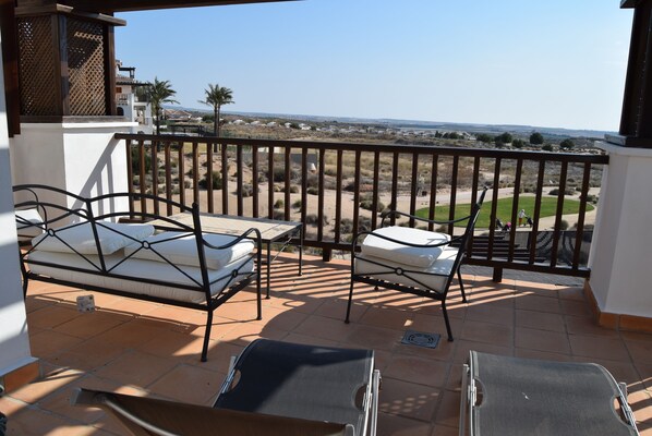 Beautiful open terrace overlooking pool Golf course and Gardens