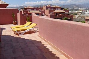 View along the terrace facing award from the sea