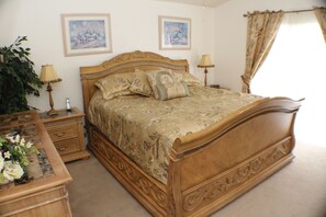 Master bedroom with King size Bed and TV.
