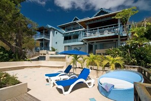 Tanning deck - with the cooling sounds of the pool waterfall behind you.
