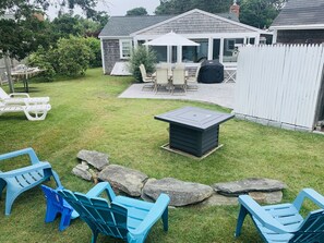 Great backyard with a propane fire pit 