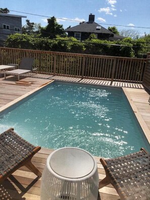 Beach House with New Pool & large deck & Steps to Ocean Renovated interiors.