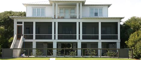 Back of the house-choose btw the upstairs deck, covered porch and pool/loggia 